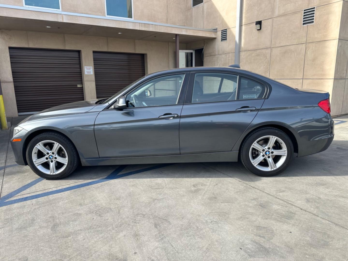 2014 Gray /Black BMW 3-Series 320i xDrive (WBA3C3C57EP) with an 2.0L L4 DOHC 16V engine, Automatic transmission, located at 30 S. Berkeley Avenue, Pasadena, CA, 91107, (626) 248-7567, 34.145447, -118.109398 - Navigation! Back-up camera! 2014 BMW 3-Series 320i xDrive - The Ideal Choice in Pasadena, CA Looking for top-tier BHPH cars in Pasadena, CA? Look no further than the 2014 BMW 3-Series 320i xDrive. As a reputable BHPH dealer in Los Angeles, CA, we take pride in offering some of the finest pre-own - Photo#1